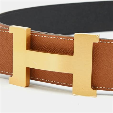 putting h on Hermes belt